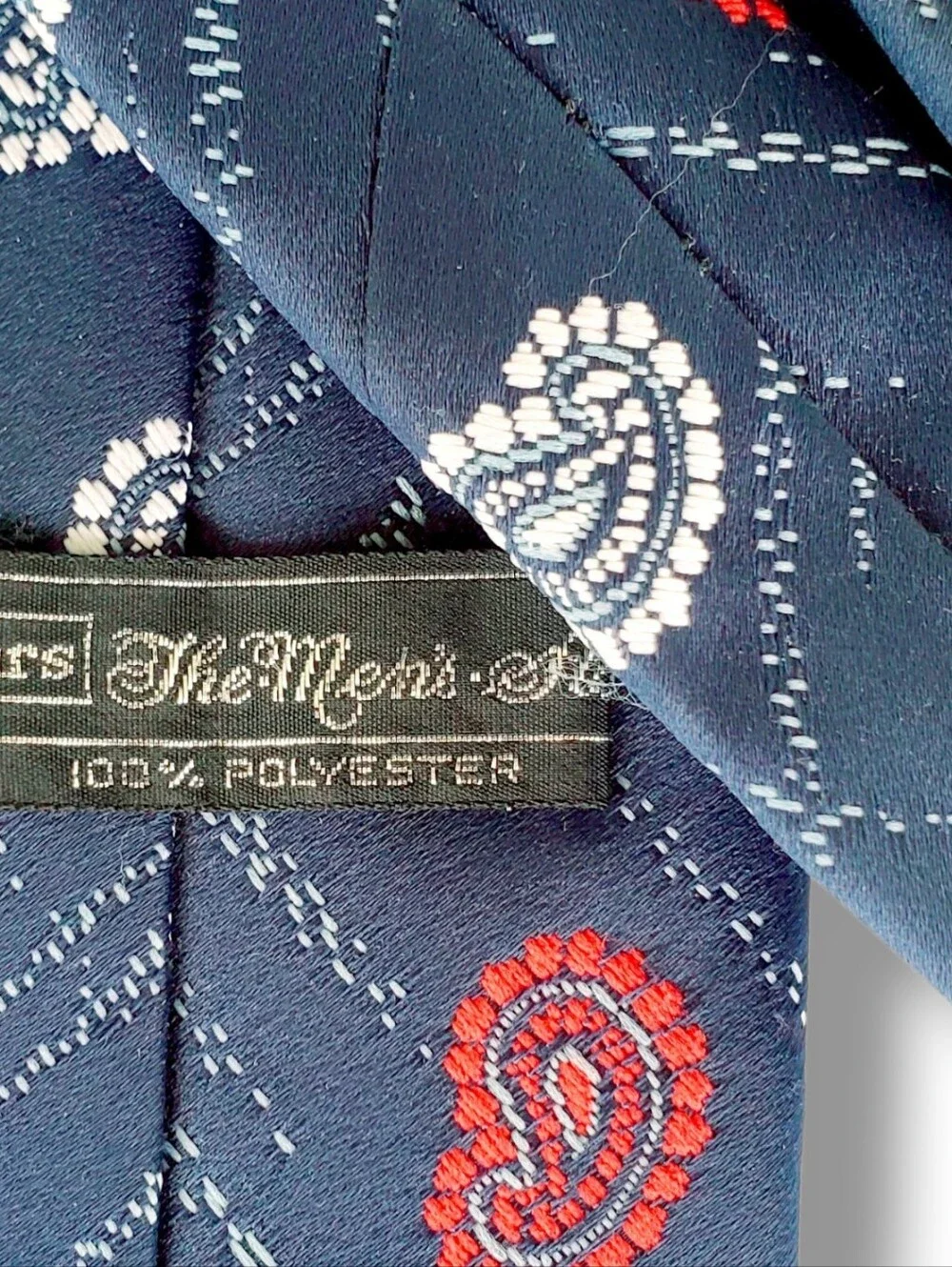 Sears Men's Shop vintage necktie features a classic navy blue base woven Paisley